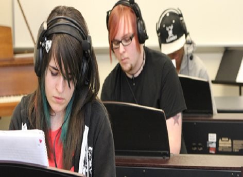 Students wearing headphones.
